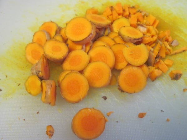 Fresh Turmeric root chopped in Kicked up Apple Cider